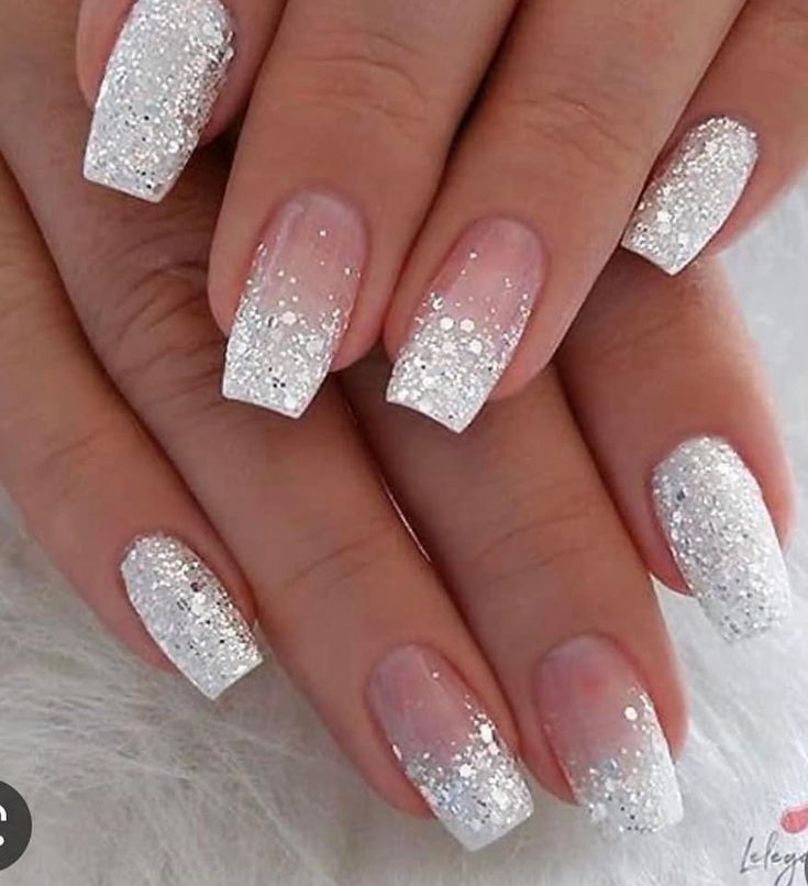 Dazzling Ombre Glitter Nails: Clear to Shimmering White for Festive Elegance