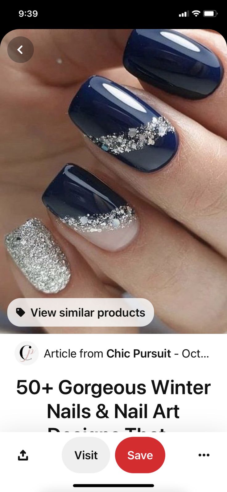 Chic Navy Blue and Silver Glitter Nail Design for Elegant Occasions.