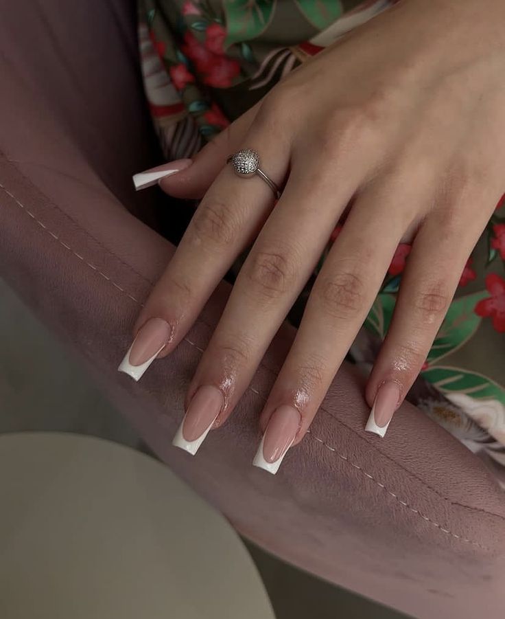 Sophisticated Nude and White French Tip Nail Design for Every Occasion.