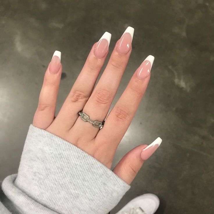 Elegantly Styled French Tip Manicure with Soft Pink Base and Sophisticated Shape.