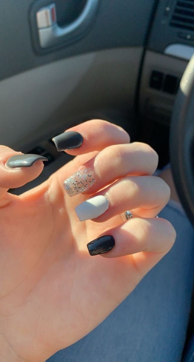 Chic Monochrome Nail Design: Bold Black, Slate Gray, and Silver Glitter Accents.