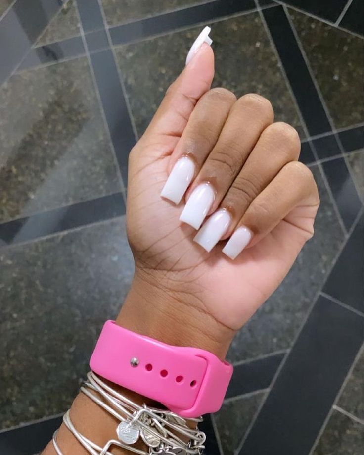 Elegant Classic French Tip Nails Enhanced by a Vibrant Pink Watch.