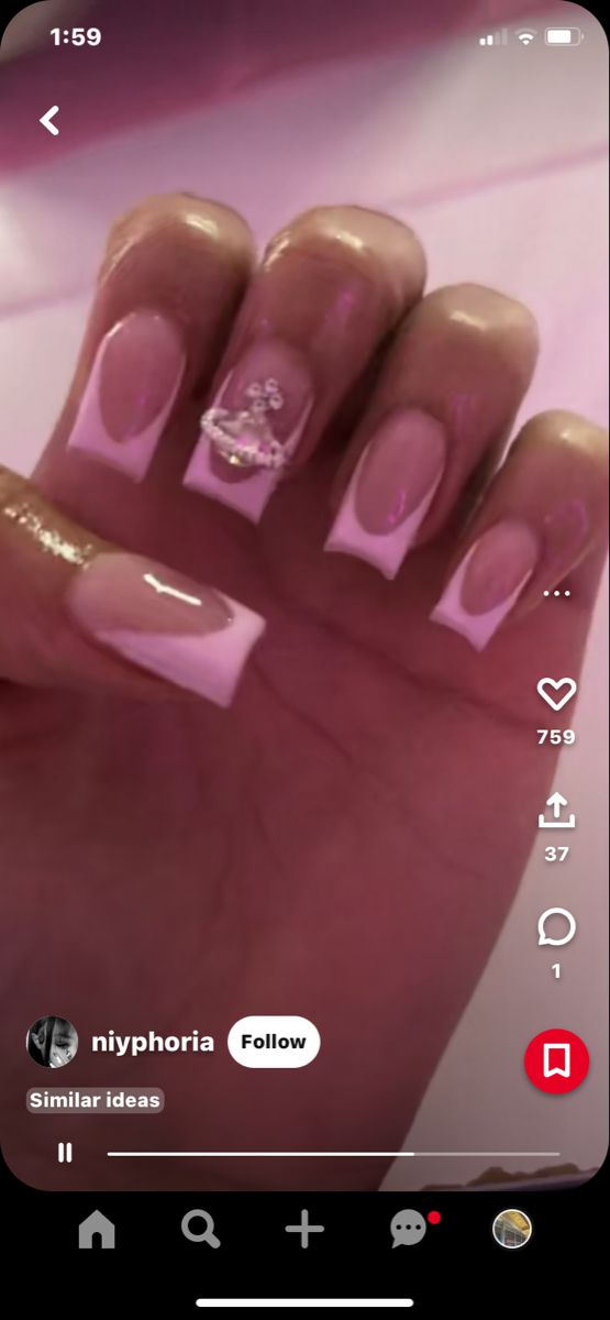 Sophisticated Soft Pink and White Nail Design with Glamorous Gem Accent