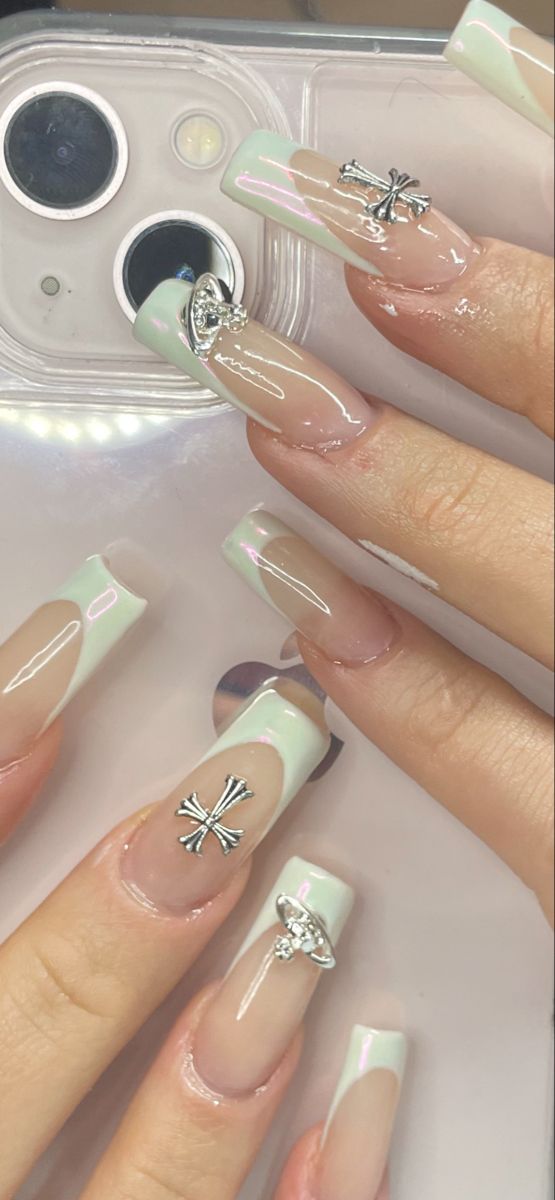 Elegant Pastel Mint and Nude Nail Design with Silver Charms