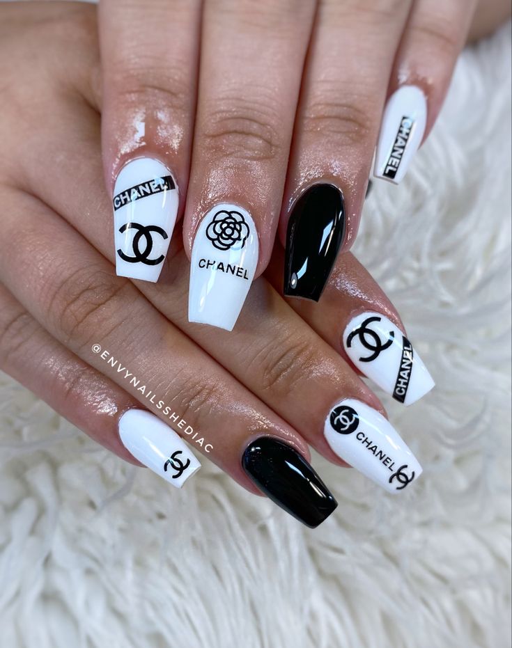 Chic Black and White Nail Art: A Luxurious Blend of Modern Aesthetics and Timeless Branding.