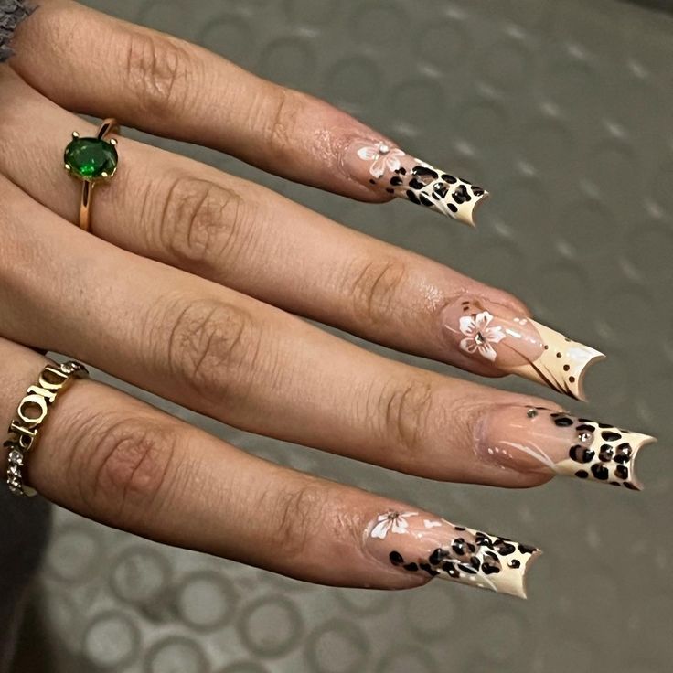 Chic Neutral Long Nails with Playful Animal Prints and Floral Accents.