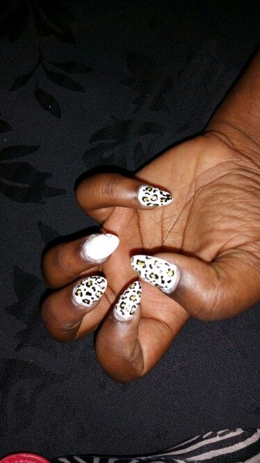 Bold Leopard Print Nail Design: A Creative Statement with Chic Contrast.