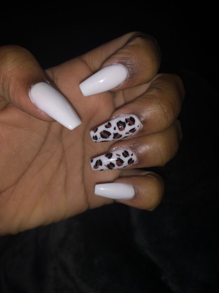 Chic Nail Design: Elegant White and Bold Animal Print Fusion