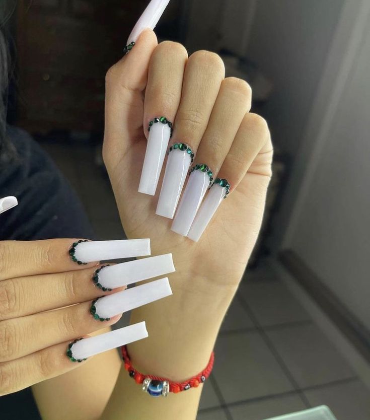 Chic Glossy White Long Nails with Black and Green Accents: A Perfect Blend of Minimalism and Flair.