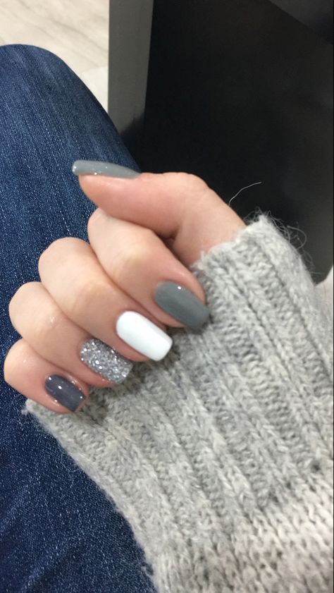 Chic Elegant Nail Design with Soft Gray, White, and Glitter Accents.