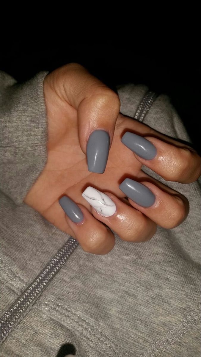 Elegant Gray Nails with Striking Marble Accent: A Perfect Blend of Simplicity and Sophistication.