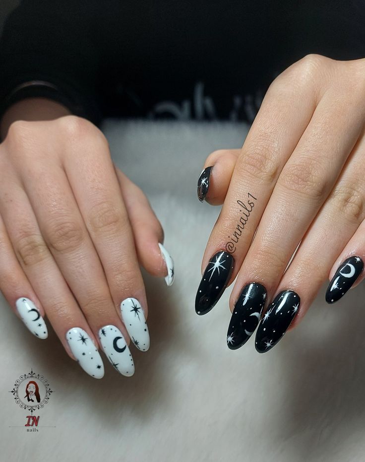 Enchanting Cosmic Nail Design: Striking Black and White Moons and Stars