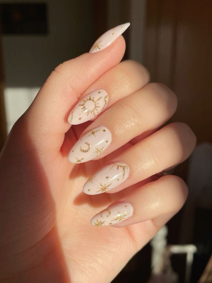 Celestial-Inspired Almond Nails: A Glamorous Blend of Elegance and Whimsy