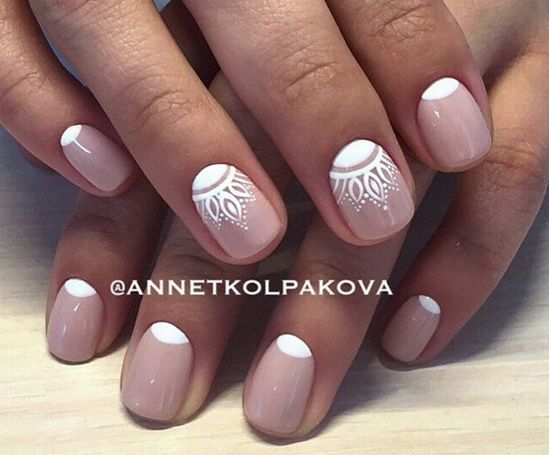 Sophisticated Nude and White Nail Design with Chic French Tips and Lace Details