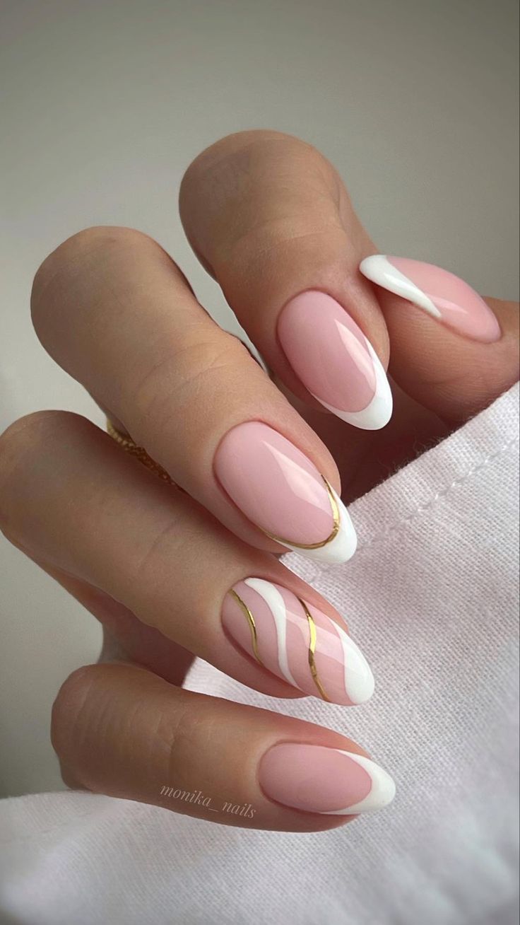 Sophisticated Nail Design with Soft Pink, White, and Gold Accents