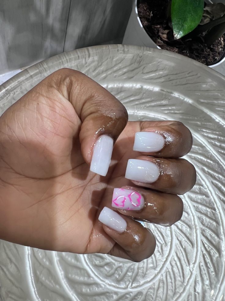 Chic Elegant Nail Design: Glossy White Base with Delicate Pink Butterfly Accent.