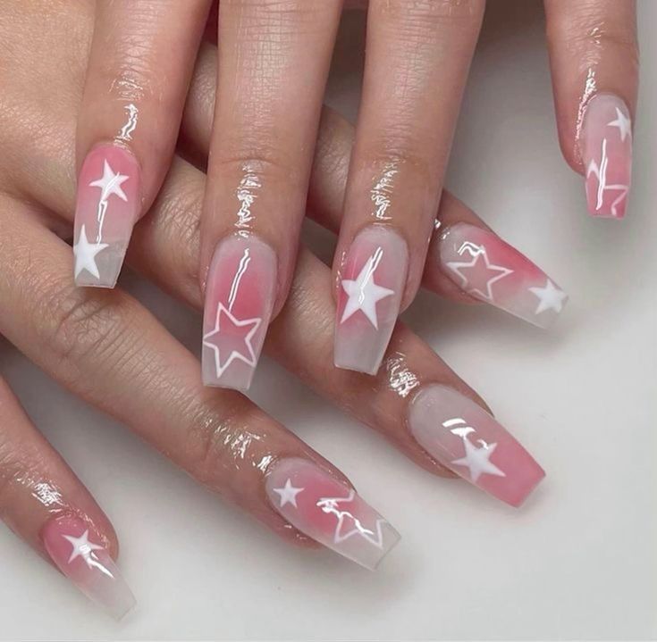 Dreamy Glittery Star-Studded Nails with Soft Pink Gradient for Whimsical Charm.