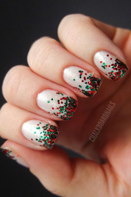 Cheerful Holiday Nail Design: Shimmering Silver Base with Red and Green Glitter