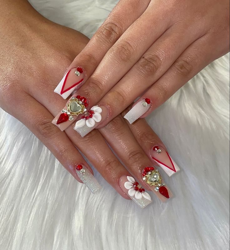 Glamorous White and Red Nail Design with Floral Motifs and Geometric Details