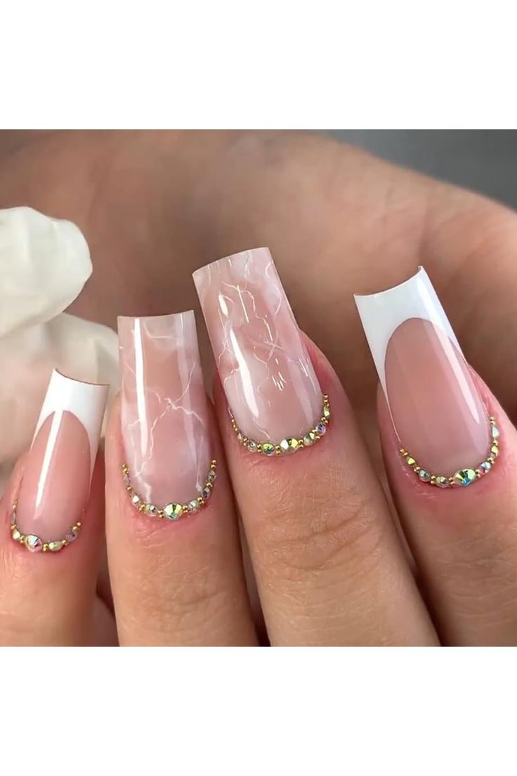 Sophisticated Nail Design: Glossy and Matte Finishes with Marble Effect and Iridescent Rhinestones.