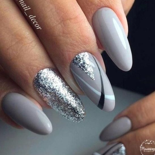 Chic Gray Nail Design with Glitter and Sleek Accents for Any Occasion.