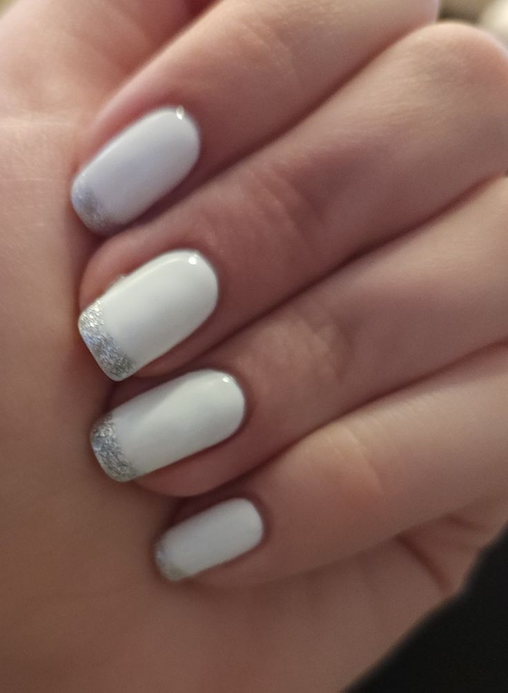 Chic White Nails with Subtle Silver Glitter for Elegant Style