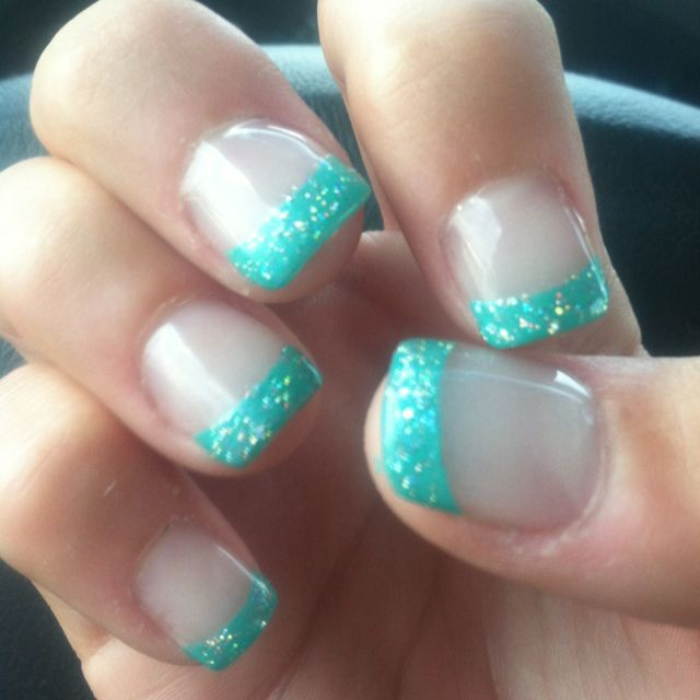 Elegant Turquoise French Tip Nail Design with Glitter Accents