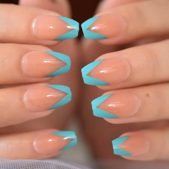 Chic French Tip-Inspired Nail Design: Modern Geometric Look with Nude and Teal Accents.