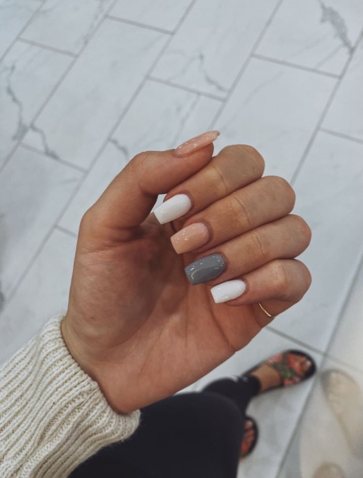 Chic Asymmetrical Nail Design with Muted Color Palette