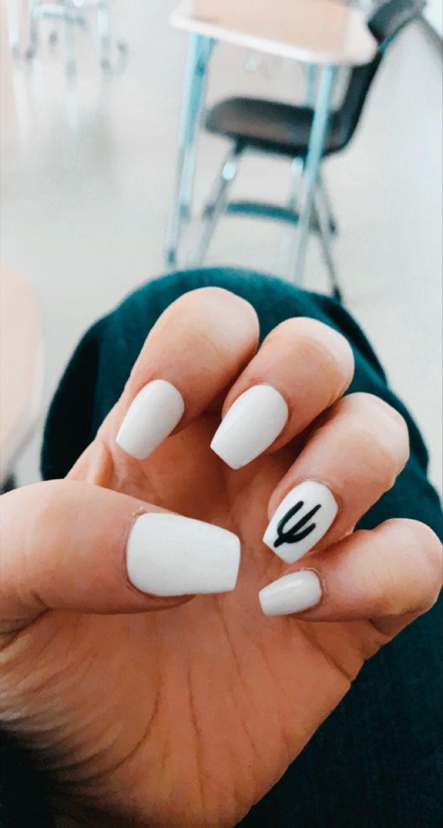 Chic White Acrylic Manicure with Playful Cactus Accent Nail.