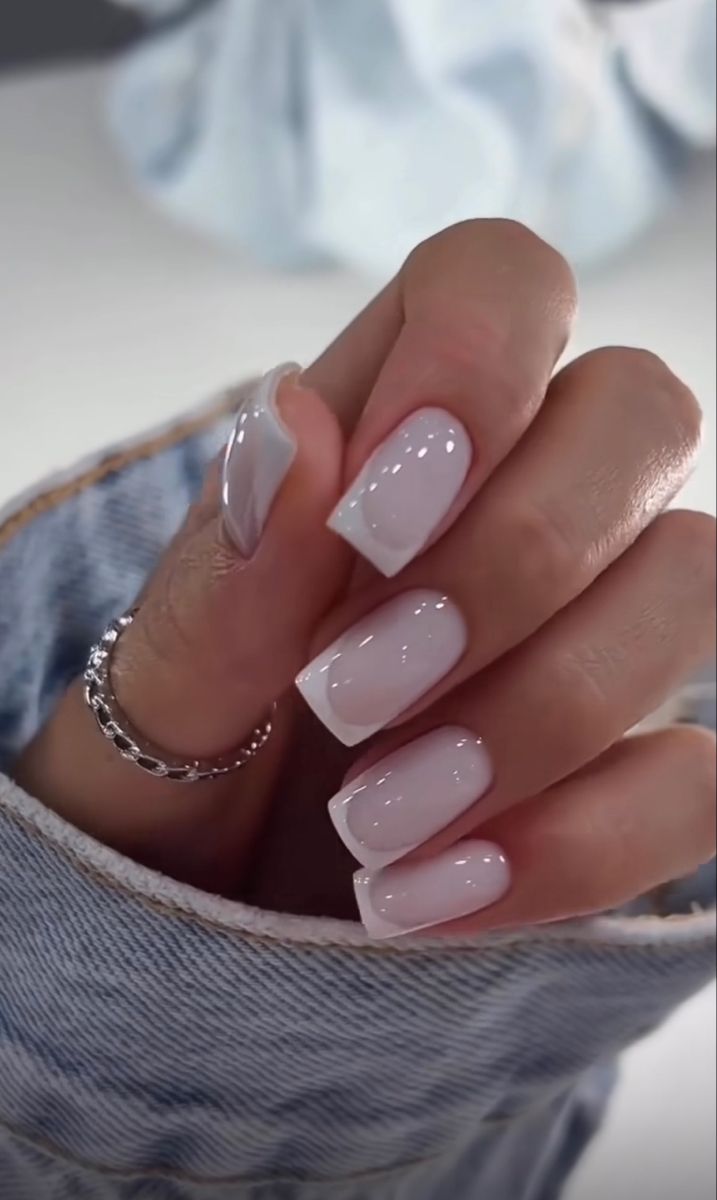 Sophisticated Gradient French Tip Nail Design: Subtle Elegance for Any Occasion.