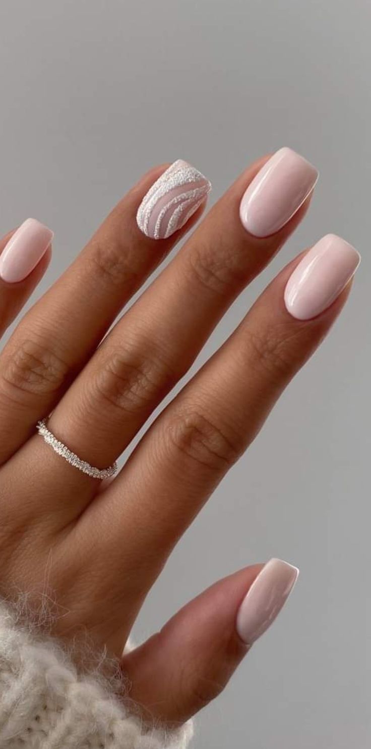 Sophisticated Blush Pink Nail Design with Elegant White Accent.