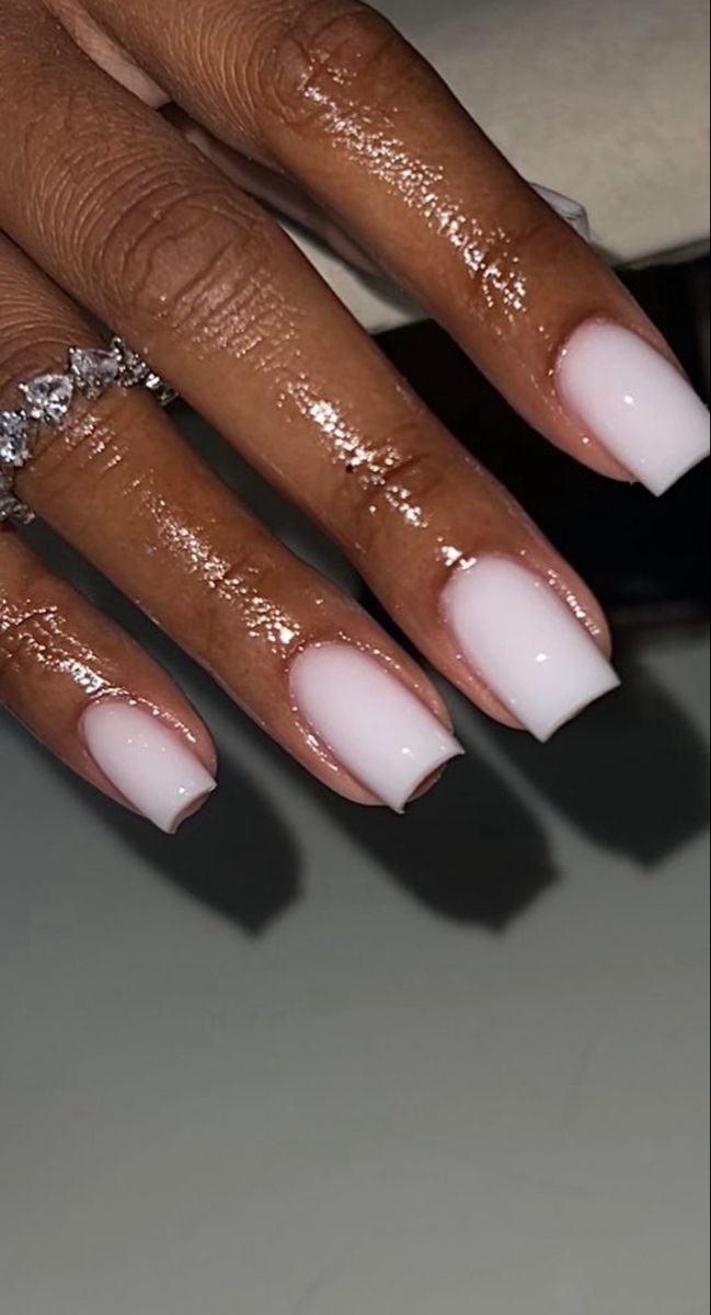 Elegant Nude Nails: Chic, Versatile, and Glossy Finish for Any Occasion.