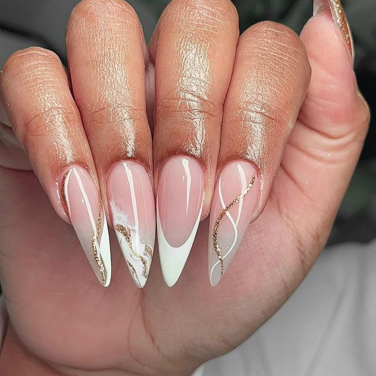 Chic Almond-Shaped Nail Design with Soft Pink, Glossy White, and Golden Marble Accents.