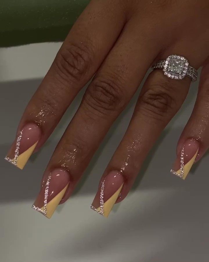 Elegant Angular Nail Design with Soft Pink and Yellow Accents