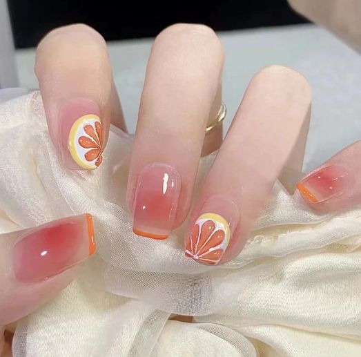 Chic Gradient Nail Design with Floral Accents for a Seasonal Refresh.