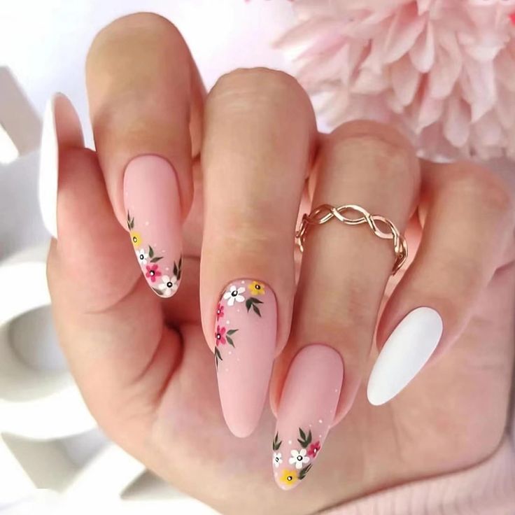 Spring-Inspired Elegant Floral Nail Design with Soft Pink Base and Vibrant Hand-Painted Flowers.