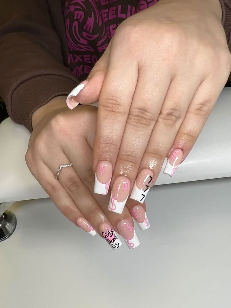 Trendy Chic Nail Design: French Tips with Playful Graphics in Pink and White.