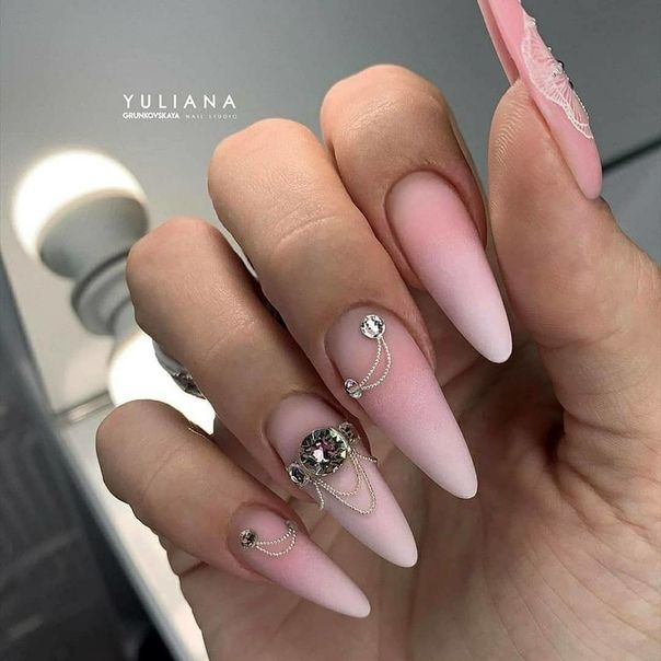 Chic Ombre Stiletto Nails Embellished with Rhinestones and Chains.