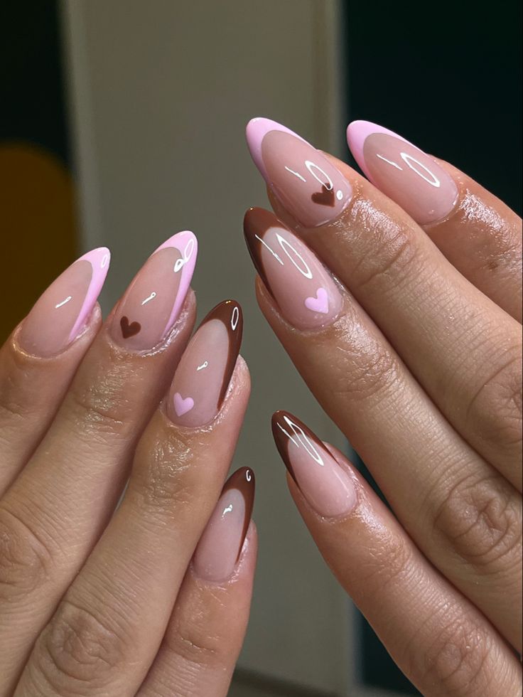 Charming Nail Design: Soft Pinks and Rich Browns with French Tips and Heart Accents