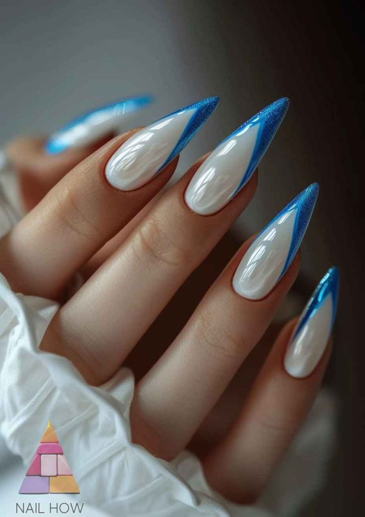 Edgy Nail Design: Bold Shapes and Glossy White with Vibrant Blue Accents