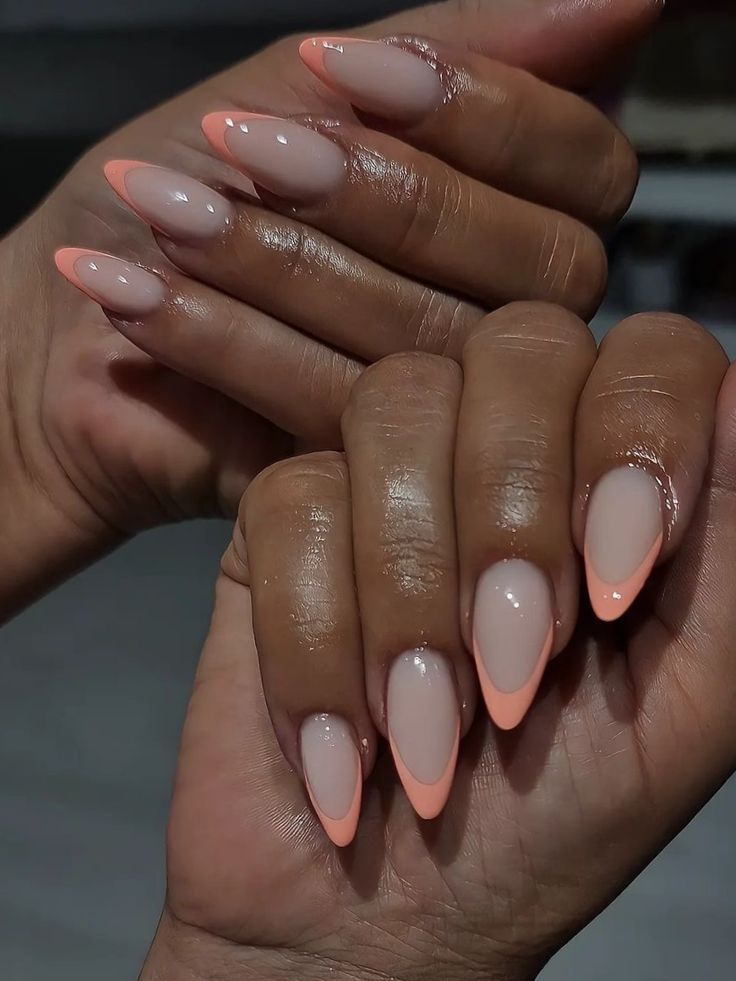 Chic Elegant Almond-Shaped Nails with Soft Nude Base and Vibrant Coral Tips