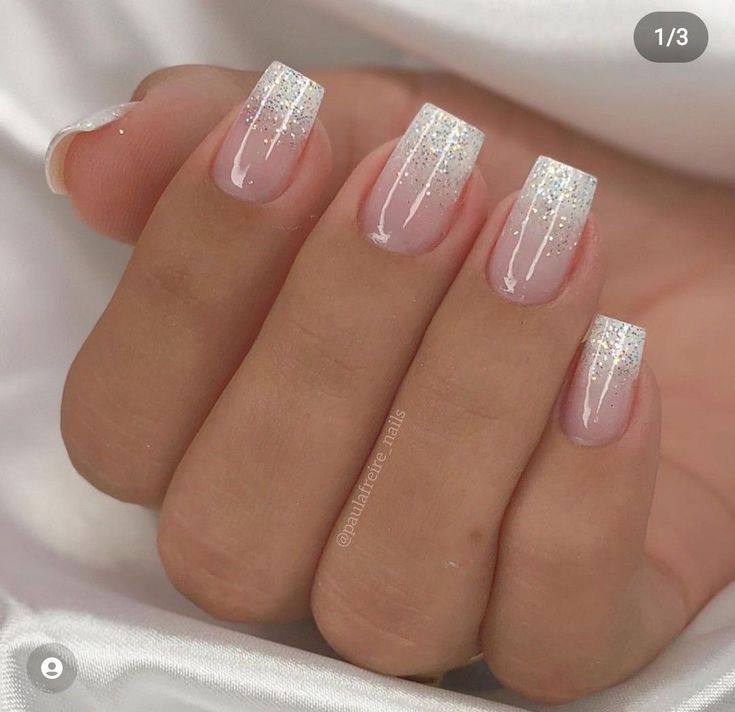 Chic Long Square Nail Design: Gradient Pink to Sparkly Silver with Glitter Accents.