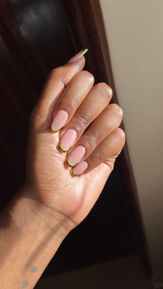 Chic Elegant Soft Pink Nails with Striking Gold Tips.