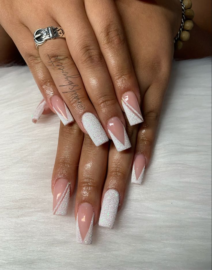 Chic Soft Pink and Sparkling White Nail Design with Diagonal Accents