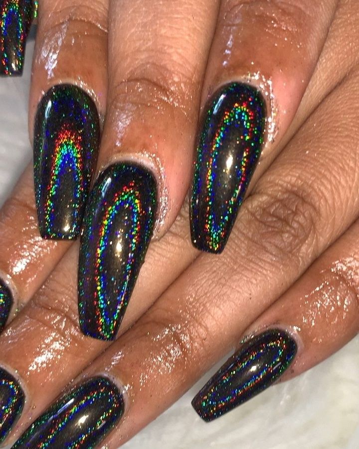 Captivating Holographic Nail Design with Glossy Black Base and Radiant Rainbow Glitter.