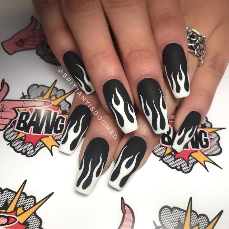 Dramatic Flame-Inspired Black and White Matte Nail Design for Bold Statements.