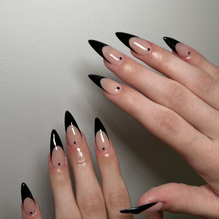 Chic Black and Nude Nail Design with Glossy Finish and Minimalist Dots