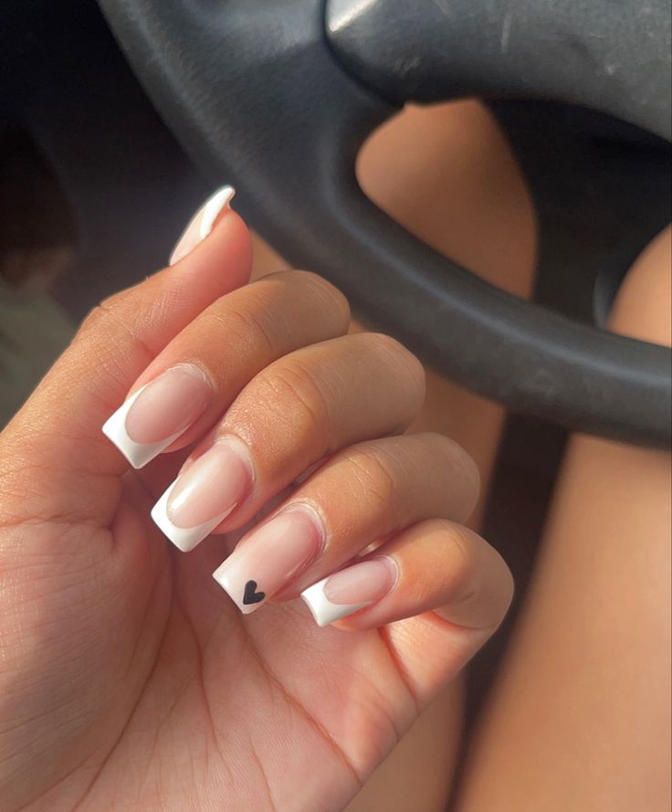 Chic French Tip Nails: A Modern Blend of Elegance and Playful Charm.