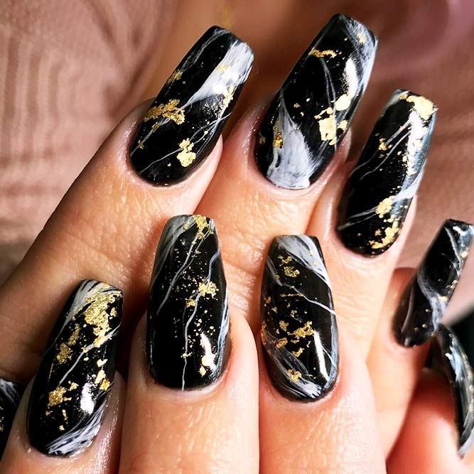 Chic Black Marble Nails with White Swirls and Elegant Gold Flakes